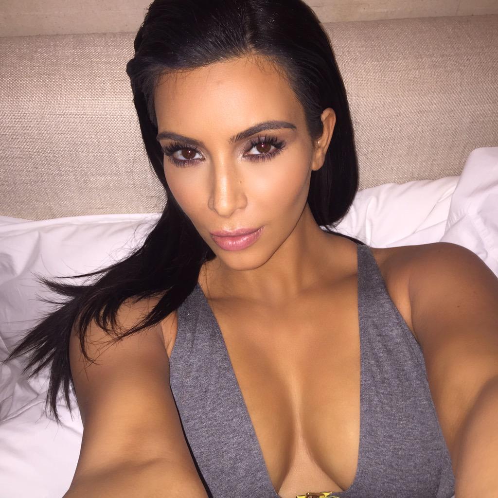 KimKardashian's tweet photo. #TBT last night right before I fell asleep with all of my make up on grrrrrr http://t.co/D7qGzX4rLp