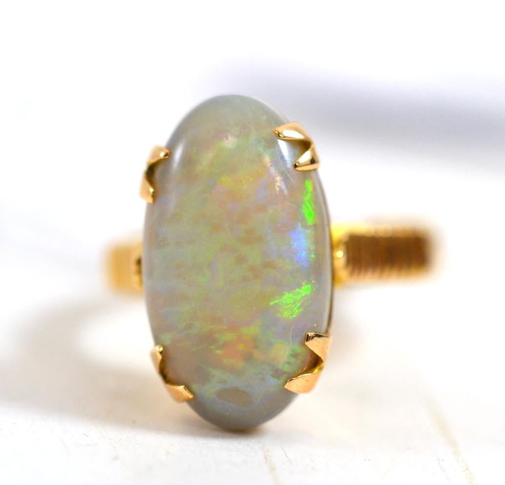 TennantsAuction's tweet photo. This lovely #opal ring is lot 423 in Saturday's Country House Sale with estimates of £200 - 300 #treatyourself http://t.co/5rTdKXKvZL