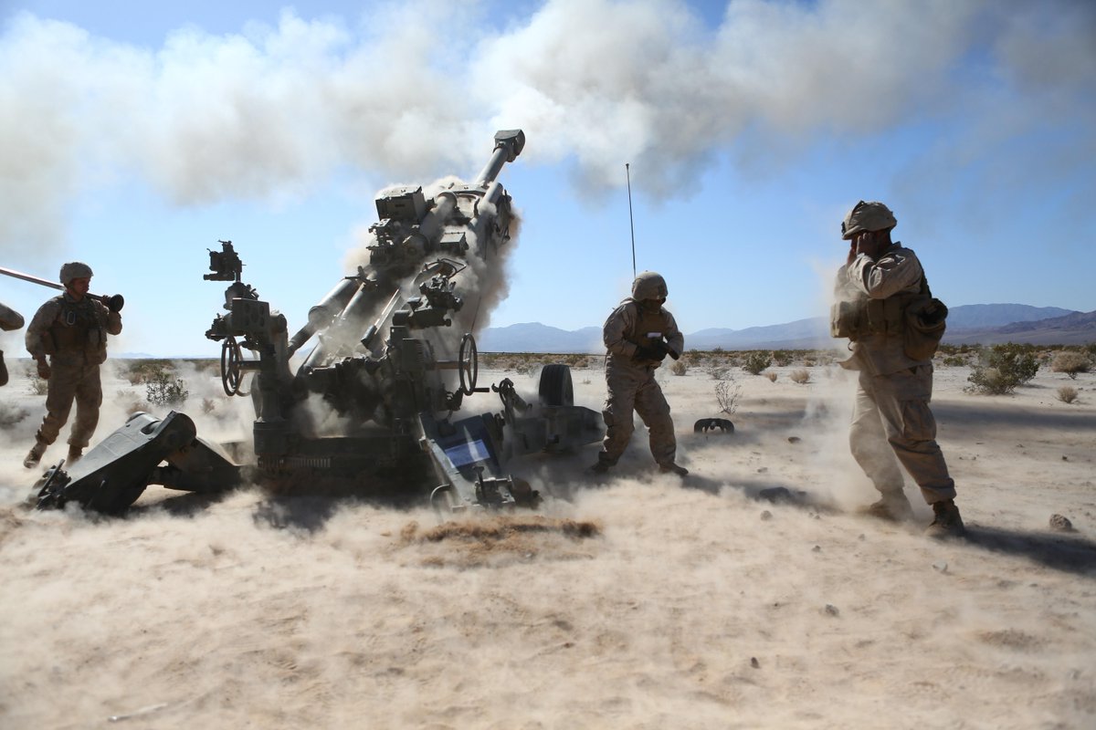11thMarines's tweet photo. On the gun line: 11th Marines sends rounds down range #CannonCockers http://t.co/dcA4ibKiJ2