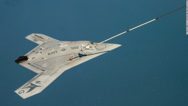 CNN's tweet image. Navy drone makes history with refueling maneuver: cnn.it/1EjmlO2