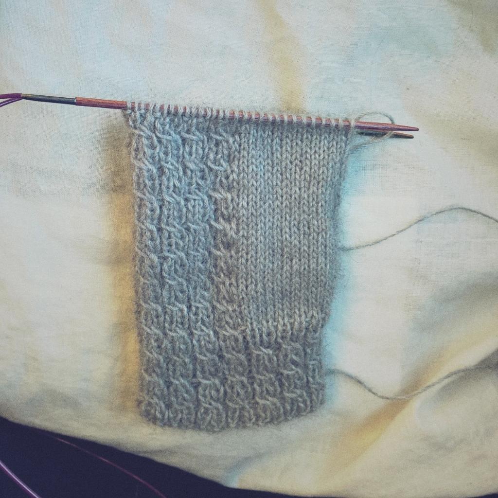 aimeecknits's tweet photo. Loving everything about knitting this glove: tiny yarn, tiny needles, tiny cables #trainknitting http://t.co/18j5lXjj3p