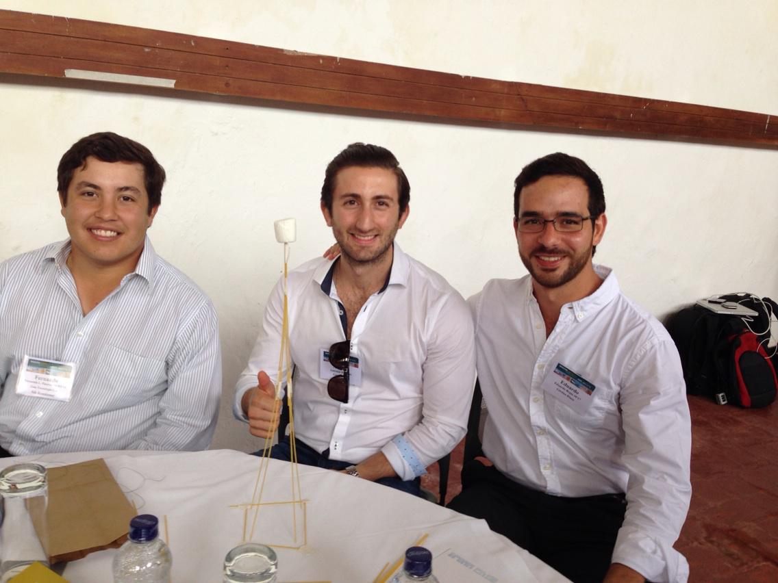 Babson alums building marshmallow tower with Jay Rao in Cartagena