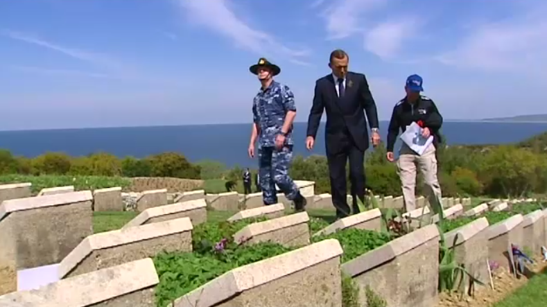 9NewsAUS's tweet photo. Prime Minister @TonyAbbottMHR has paused to pay his respects at the ANZAC war graves at Gallipoli. #AnzacDay #9News http://t.co/d5US88y8iY