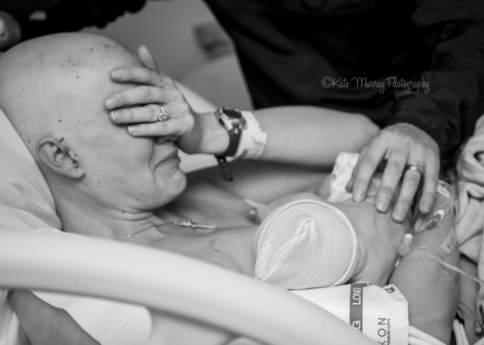 kfor's tweet photo. Powerful photo of mom battling cancer and newborn is ‘definition of strength, love’ http://t.co/QUOkoDoQsE http://t.co/AqRMSywa8u