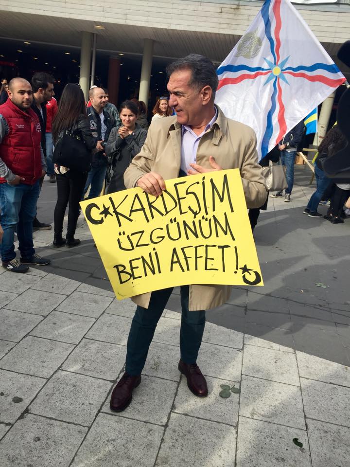 DeadmanMax's tweet photo. a turkish man at the protest today, the sign reads: "my brother. i am sorry. forgive me!" #armeniangenocide #assyrian http://t.co/k5AV9G6ipP