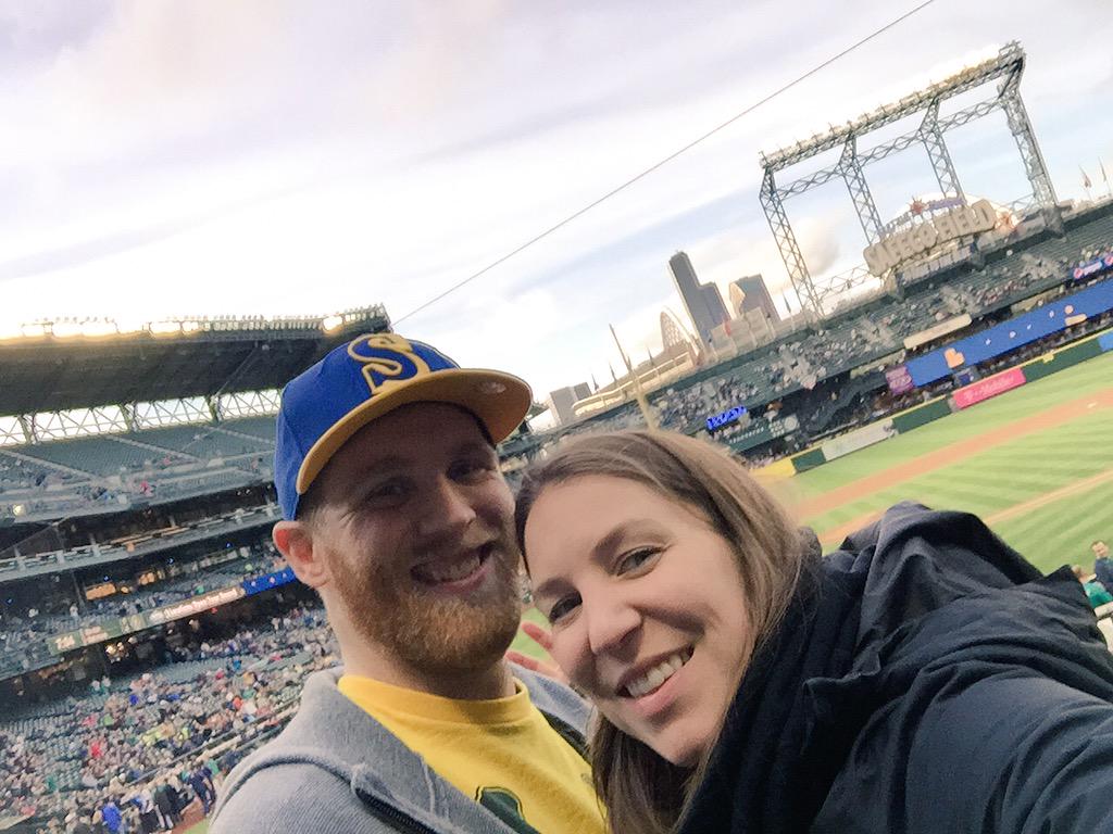 MikaelaCJudd's tweet photo. Game time! #Mariners #FirstWeekMarried #BestWayToCelebrate http://t.co/C6A8R1wzaV