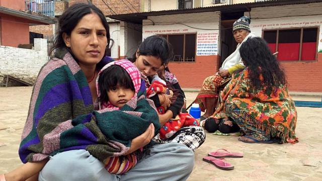 straits_times's tweet photo. People take refuge at a school after a 7.9 magnitude earthquake struck #Kathmandu in #Nepal http://t.co/BhsQdtpypj http://t.co/GH0NOEJXrK