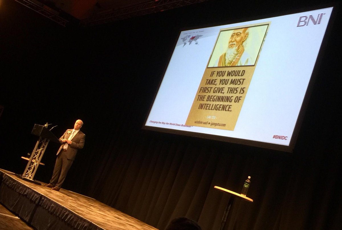 CD_Read's tweet image. The awesome Dan Kelly takes to the stage under an image of Lao Tzu. Extremely appropriate. #BNIDC