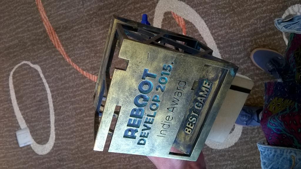 TeamGotham_'s tweet photo. We didn't expect it but.. WE WON the Game of the Year at #RebootDevelop! Thanks to everyone! #indiedev #gamedev http://t.co/MyHDhuccTc