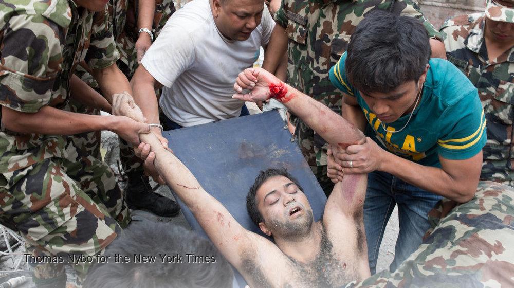 nytimes's tweet image. A survivor was pulled from the rubble in Nepal. Follow updates on the Nepal earthquake: nyti.ms/1PAhmfF