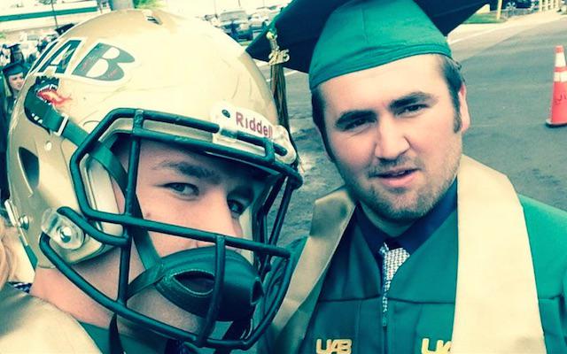 Cover3Podcast's tweet photo. LOOK: UAB LB Derek Slaughter wore his helmet to his graduation ceremony http://t.co/nKBnlaI6v5 http://t.co/J9FIiIcdWU