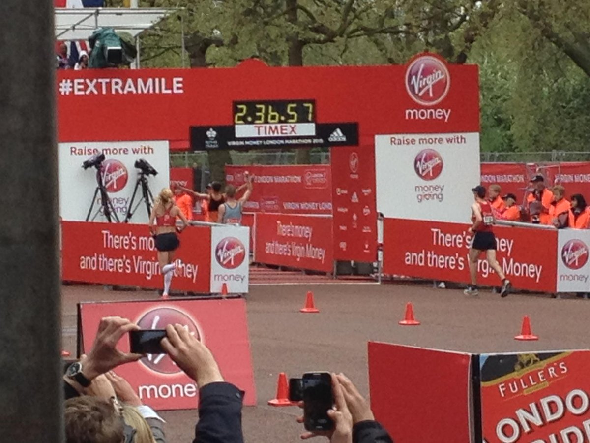JaneHansom's tweet photo. And that is @paulajradcliffe under the @TimexUK clock in 2.36 for the final time  #timexpredicts #awesome #legend http://t.co/cb3o2hD7D2
