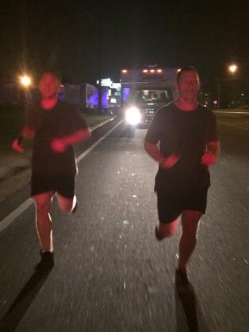 GeorgiaPower's tweet photo. A father and son team running to #FightCancer last night in Forest Park, Ga. #PowerfulRun @AmericanCancer #rftr15 http://t.co/aZMd0II6CU