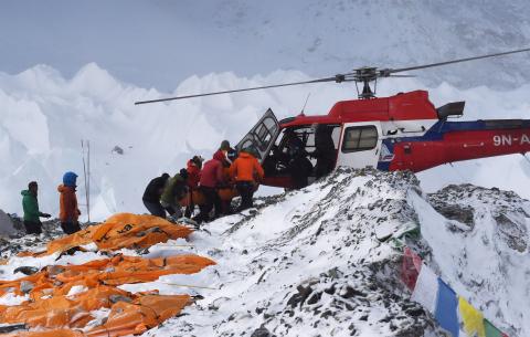 Rescue choppers pluck the badly wounded off Everest nbcnews.to/1OVeQP2