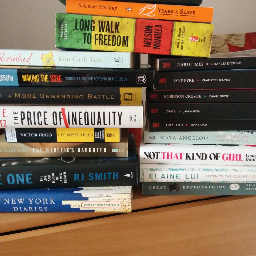 ac_karas82's tweet photo. So I have a few books I want to read over the summer....and this isn't even all of them. http://t.co/78iE0omlMJ