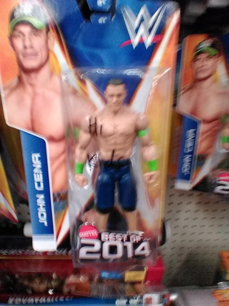 yescodyyes's tweet photo. I was at Walmart today and some guy wrote hi kids on a John Cena I bet it was @GrimsToyShow or just a dumb cool guy http://t.co/63e0ksJlSF
