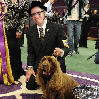 HAPPY BIRTHDAY here is a picture of Patrick Stump with a dog!!!!!! 