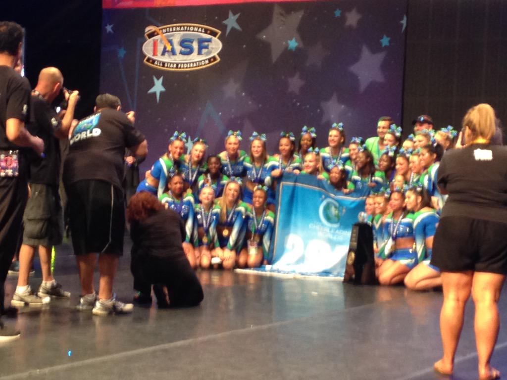 WSFCheer's tweet photo. The Stingray All Stars - Peach just WON Sr Medium! Congrats ladies! #Worlds2015 #TeamWSF 💍💍💚💙🏆 http://t.co/coGUMdKXGQ