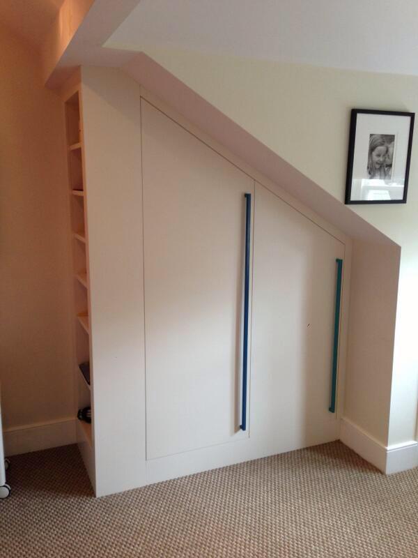 RichardJDesigns's tweet image. Making use of the awkward slopes to provide great hanging space. Sprayed finished doors, custom powder coated handles