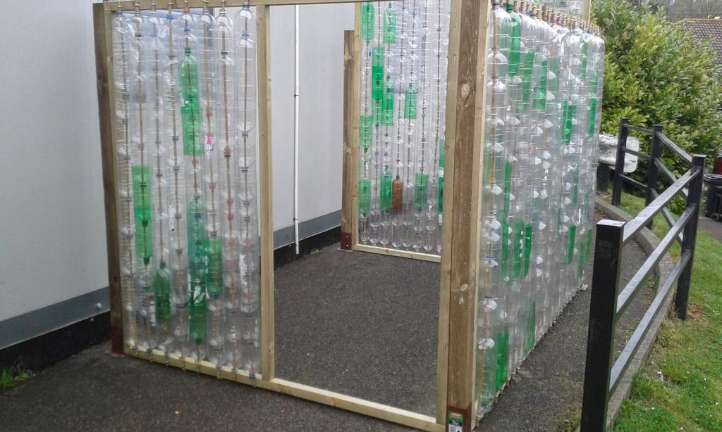 CathGrahamCRo1's tweet photo. We started to build our plastic bottle greenhouse at our school grounds day on Sunday. Thanks to parents and staff. http://t.co/HHTej7ZKUg
