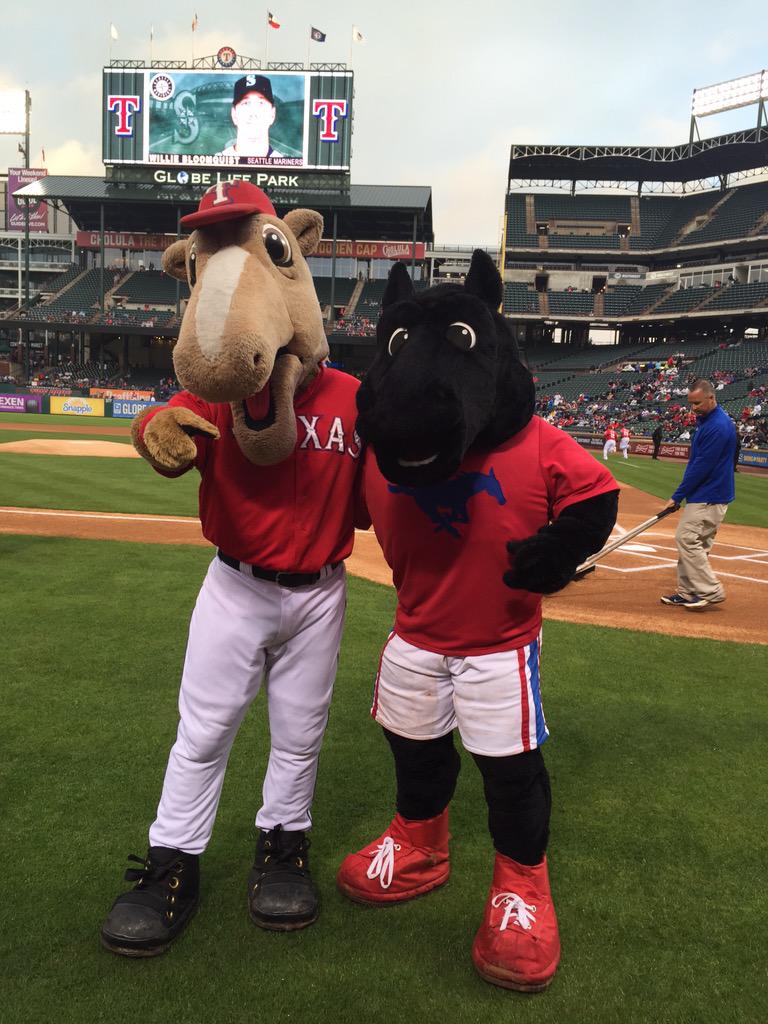 Rangers's tweet photo. It's @SMU night night in Arlington. @RangersCapt72 &amp; Peruna #PonyUp Globe Life Park. http://t.co/T3iv5zIIfF