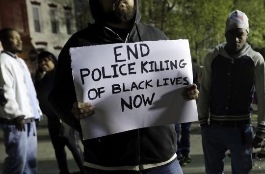theintercept's tweet photo. As Baltimore erupts in protests following #FreddieGray funeral, analysis of media coverage: http://t.co/EshsIYB7rz http://t.co/jXqpJSP3Fu