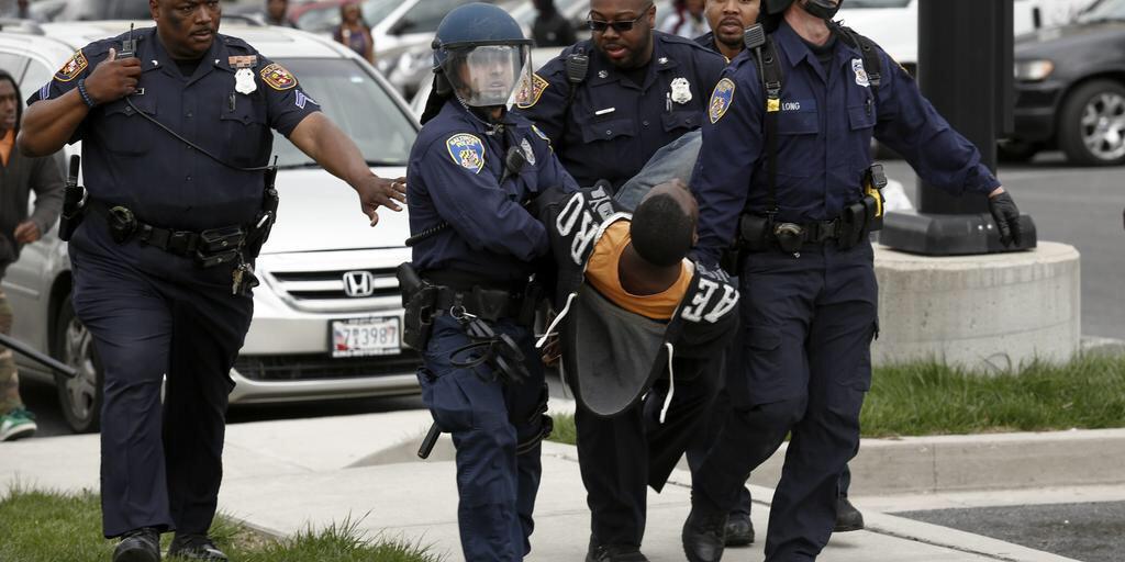 drunkamerica's tweet photo. Look at these racist white cops....wait.... http://t.co/XumtFJGyKx