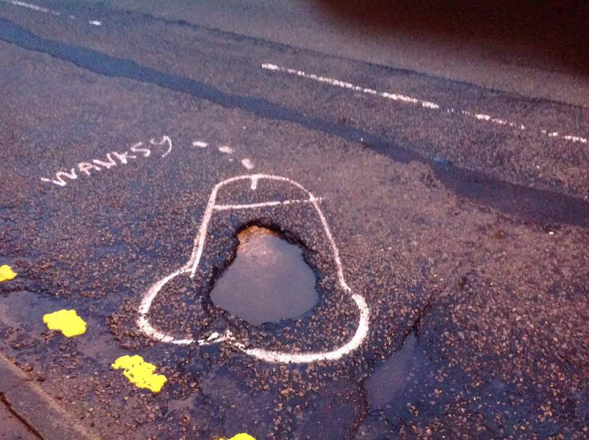 FastCoDesign's tweet photo. Meet Wanksy, a graffiti artist who draws penises to get potholes fixed: http://t.co/OaHUBb8lgY by @ctrlzee http://t.co/sFaIDpCS33