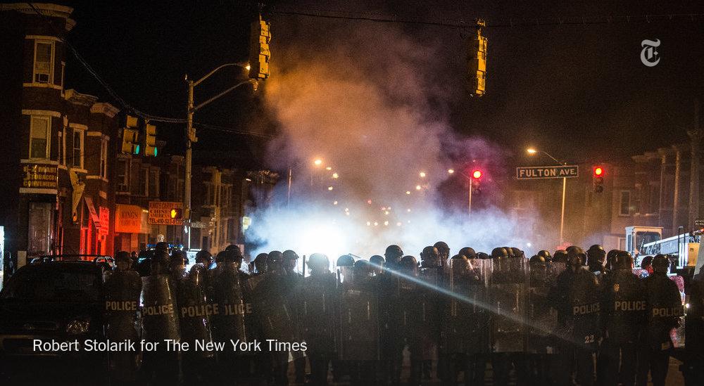 nytimes's tweet photo. Update: At least 15 police officers injured and at least 27 arrested in Baltimore violence http://t.co/pnhcT4xi1l http://t.co/GhgflcvOvF
