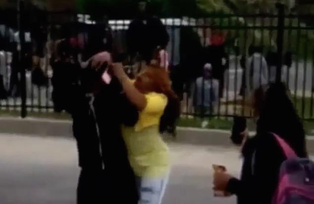 Woman called “mom of the year” after yanking demonstrator off Baltimore streets on live TV: theblaze.com/stories/2015/0…