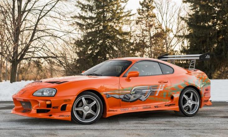 backdoorhiphopx's tweet photo. The 1993 Toyota Supra driven by Paul Walker's character from #FastNFurious is up for auction! http://t.co/isOFzgJZfX
