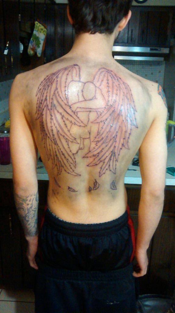 mamaapico's tweet photo. @natabooxxo #matchingtats #inlove #babydaddy #weapingangel #wheredhegetdatmoney #letmestop http://t.co/R4GU5MEyBn