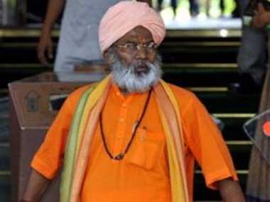 firstpost's tweet photo. Rahul Gandhi's 'impure' visit to Kedarnath caused Nepal earthquake, says Sakshi Maharaj http://t.co/ZlDpt6F6U2 http://t.co/iv3nXddR3j