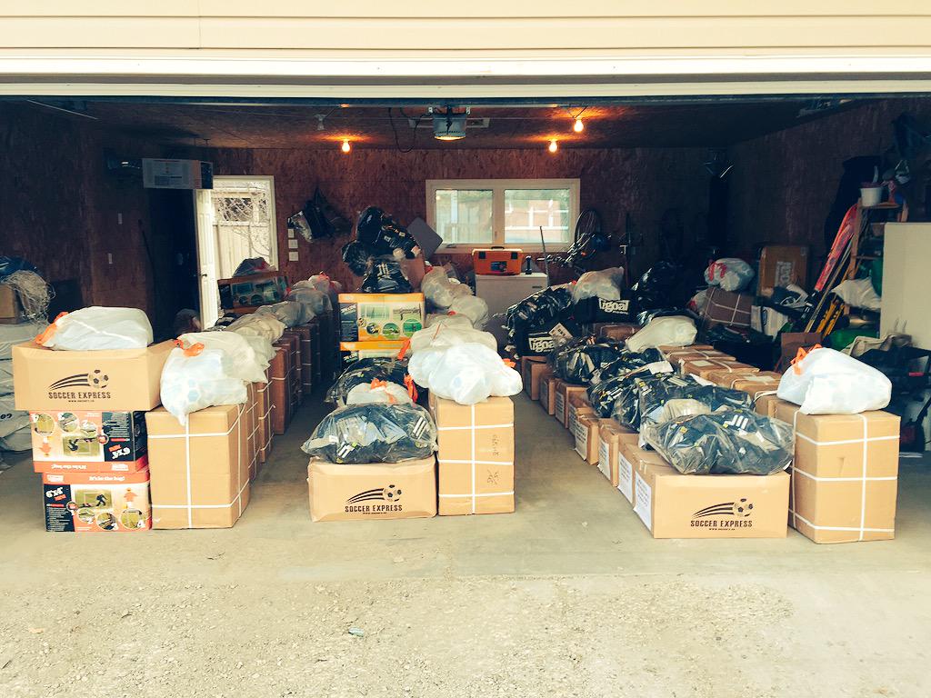 TimAdamsFF's tweet image. My garage. Free soccer equipment for 1200 #yeg kids in need. @FreeFootieYeg starts next week.