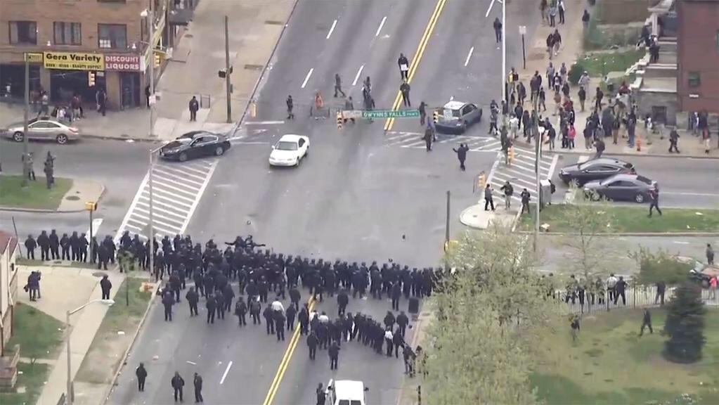 KushNBae's tweet photo. Police clash with protesters in Baltimore after #FreddieGray funeral. These cops got no ounce of heart left💔 http://t.co/0rsSSaFp0o