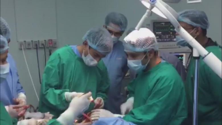 AC360's tweet photo. .@drsanjaygupta doesn’t just report on overwhelmed #Nepal hospital, he treats survivors: http://t.co/k0d9m5htkQ http://t.co/06LfdNVIya