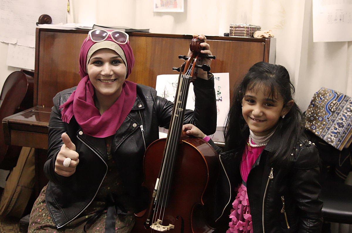 RaniaGaza's tweet photo. #ThumbsUp Field visit to see the new violins at the #Gaza #music school @ANERAorg http://t.co/LSWXGzfDpC