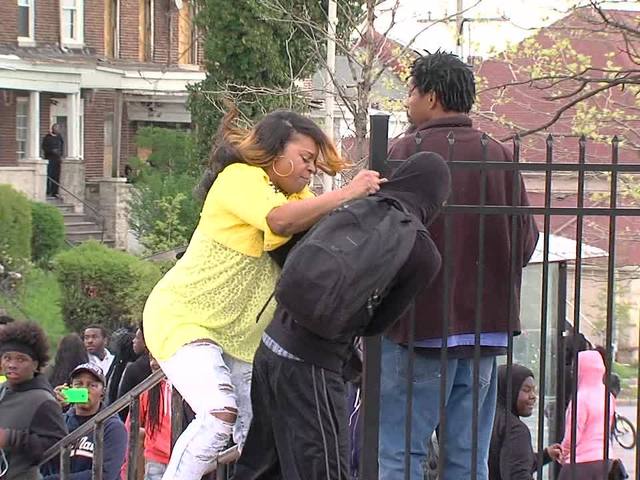 WatchItGoViral's tweet photo. More terrified of his own mother than the police #BaltimoreRiots http://t.co/JwN4zMYb4S