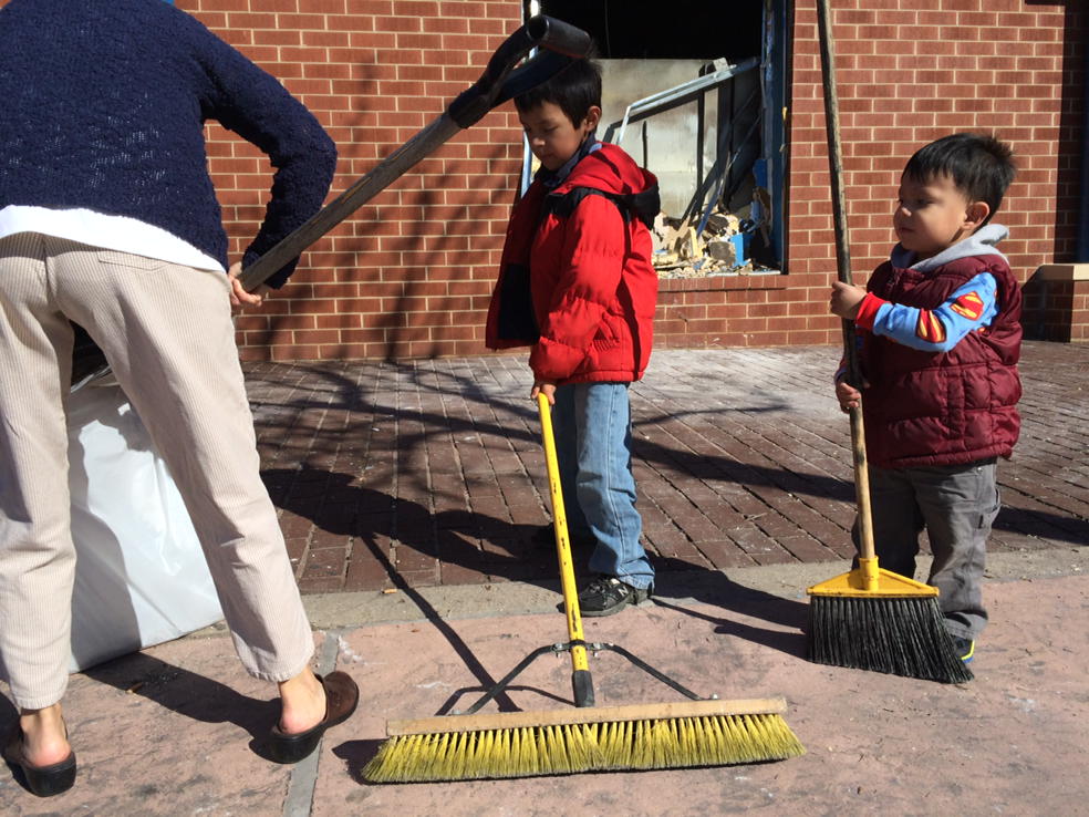 cnni's tweet image. These people are all helping clean the streets of Baltimore after Monday night's riots: cnn.it/1KpIyuG