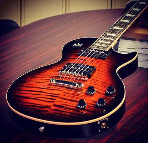 wayneUKFG's tweet photo. Sexy! “@gibsonguitar: Class 5 (in Orange Widow)... #OneOff #LesPaul from @CustomGibson http://t.co/1xSBomEZ3z”