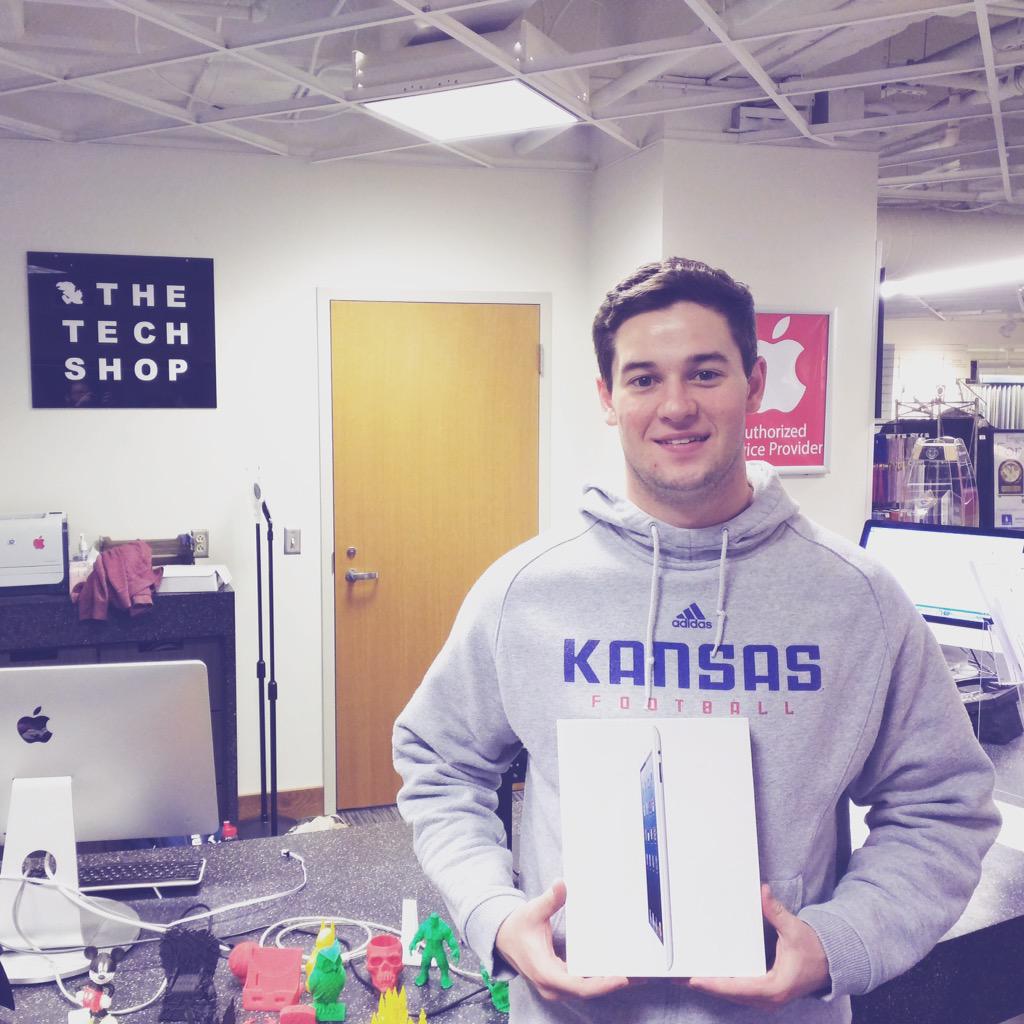 KUBookstore's tweet photo. Congrats to Nick, 1st place winner of @KansanNews' #BracketBash. Enjoy your new iPad from #TechShopKU! http://t.co/1SUsNR5F6D