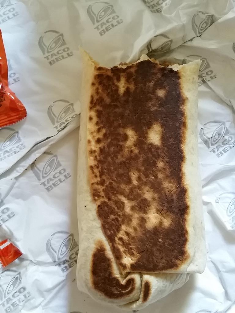 docheiny's tweet image. Thought it took @tacobell forever to make this 'cause they were busy. Turns out they just wanted to burn my quesorito
