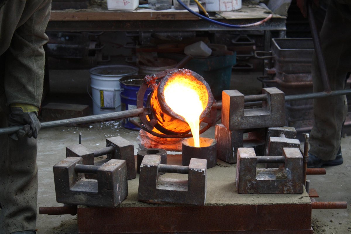 Molten bronze being poured into a sandmould
#Photooftheday #heavymetal