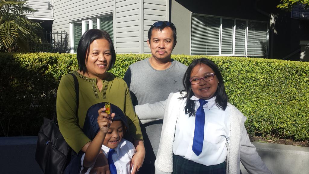 SamSaxena27's tweet photo. The Duldulao family is ecstatic on being able to own their first home! http://t.co/t9p6hKNehf