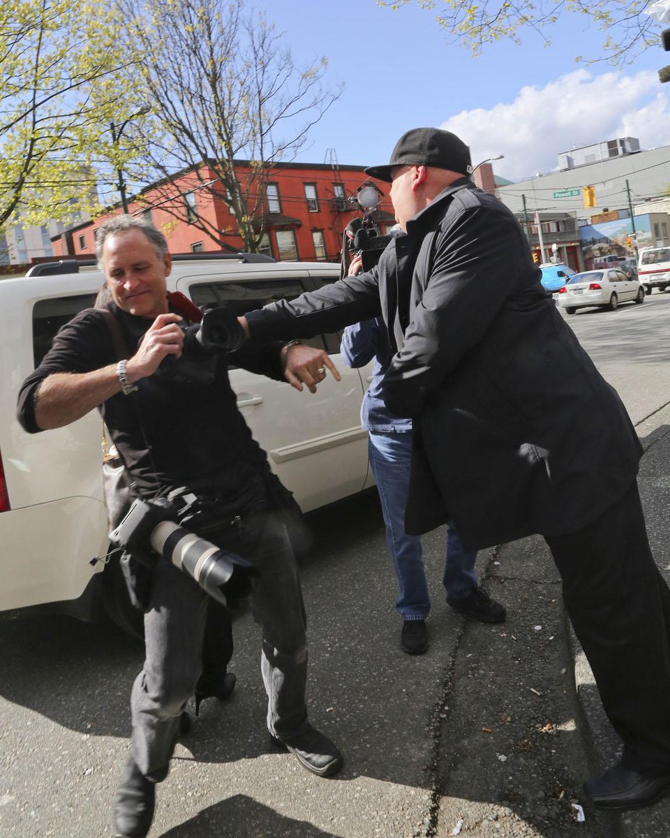 HOF_Autographs's tweet photo. @lightboxgallery Rik #Fedyk shoves @VanCanucks photographer @jeffvinnick leaving Court after hit & run incident. http://t.co/n0kDjqRjLe