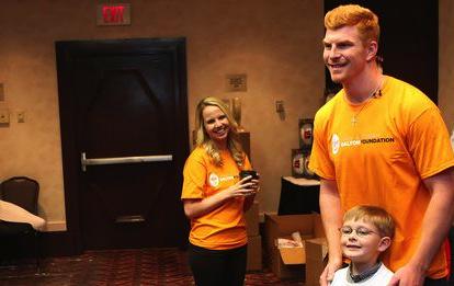 Bengals' Andy Dalton, wife host Orchids 'Date Night' for parents | Scoopnest