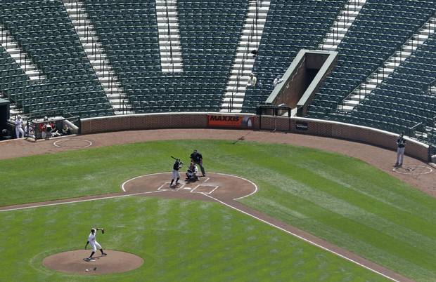 globeandmail's tweet photo. Surreal photos of the #Baltimore game without fans: http://t.co/HoDEIhdfGu http://t.co/lSM6mxnt2O