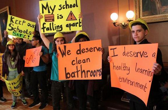 projo's tweet photo. At State House, @pvdstudentunion demands $$ to fix #RI schools, via @lborgprojocom -- http://t.co/Mq6fI2hoQk http://t.co/xItuIpHGw4