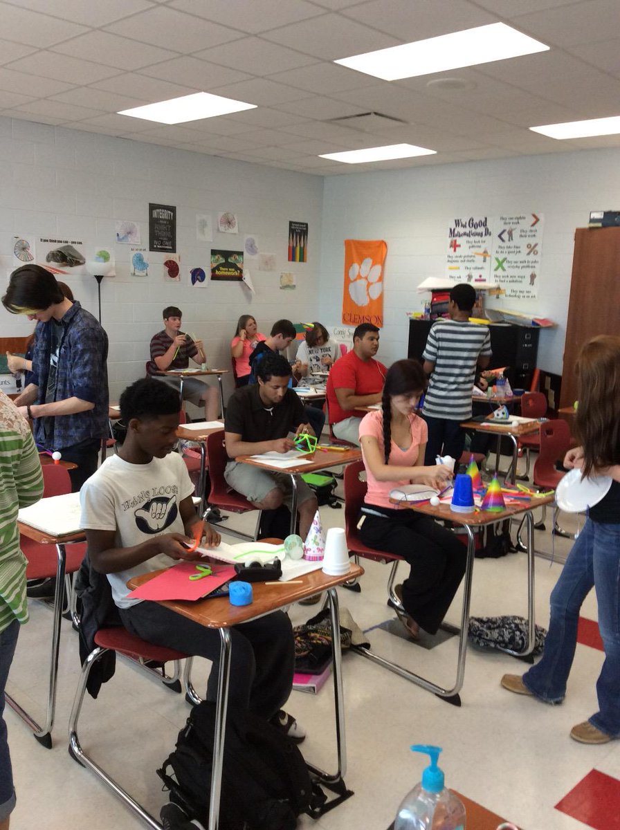 DeannaSefcik's tweet photo. Making 3D Shapes Mobiles in Geometry! #endofyearprojects #organizedchaos http://t.co/rF2qZ8M6Wm