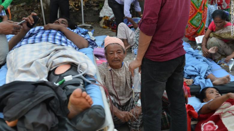 CNN's tweet photo. Today's 7.3 magnitude quake in Nepal has sent traumatized citizens back out onto the streets: http://t.co/HoTBDIhQjf http://t.co/cFRyDKD9FV